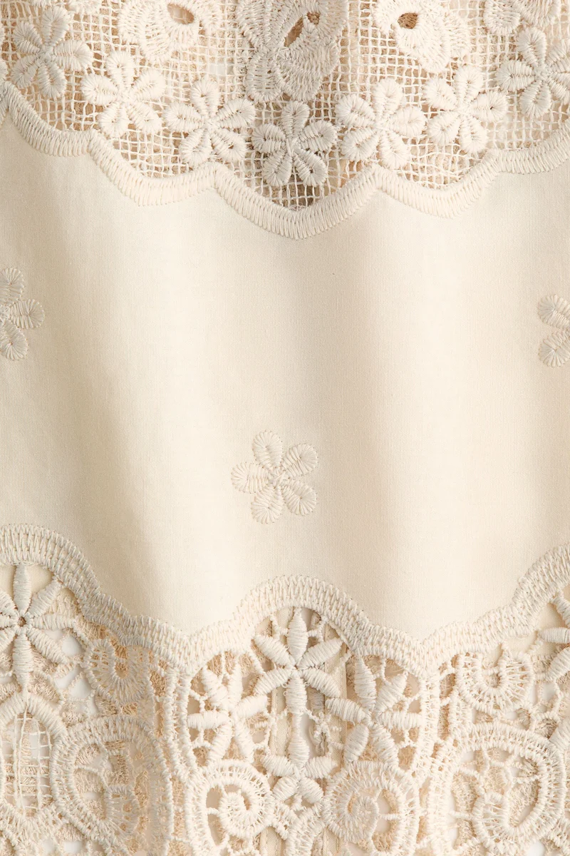 اتش اند ام تنورة قطنية مزينة بتطريزات